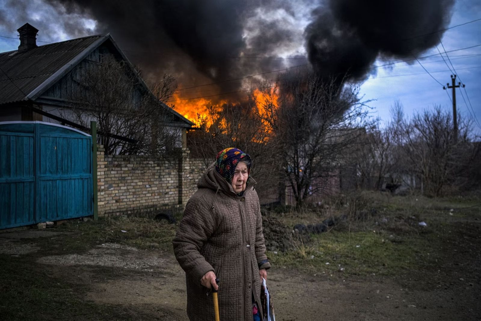 Фотохроника войны. Главные снимки марта: охота на активистов, похороны  солдат и Путин на оккупированной земле